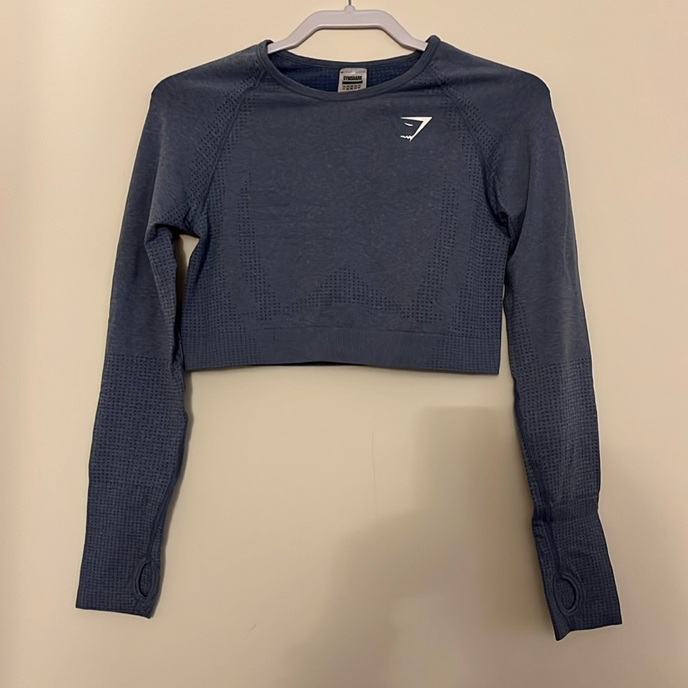 Gymshark size Large. Blue long sleeve crop top with thumb hole.